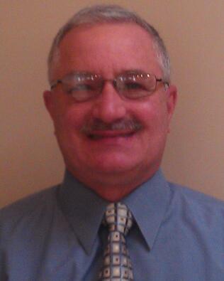 Headshot of Andrew Skokos