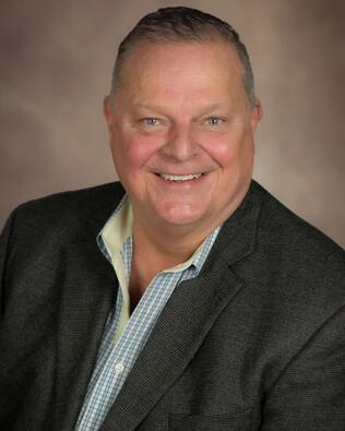 Headshot of Tommy Higgins