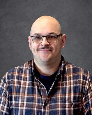 Headshot of Damien Smith