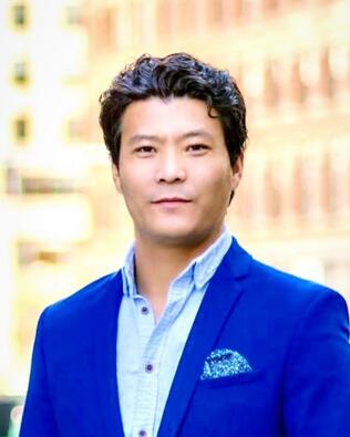 Headshot of Tenzin Migmar