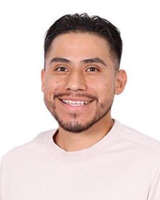 Headshot of Adam Martinez