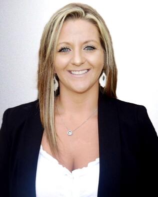 Headshot of Cara Delacruz