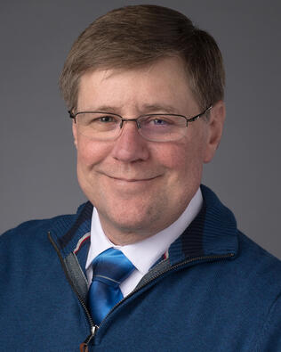 Headshot of Tony Amstutz