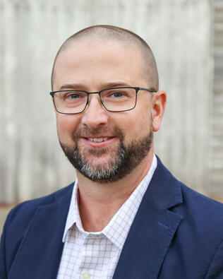 Headshot of Charlie Coode
