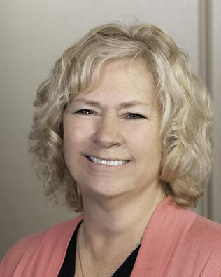 Headshot of Laura Toms