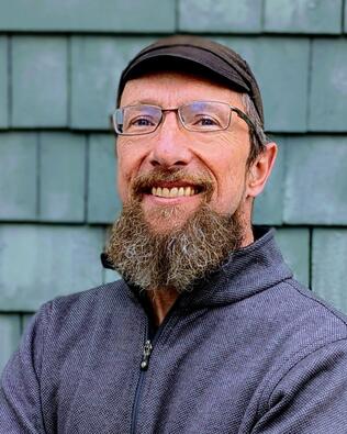 Headshot of John Hanna-Barton