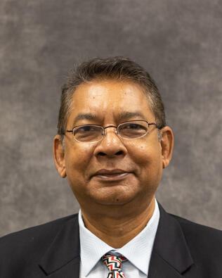 Headshot of Imran Alam