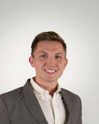 Headshot of Damien Angle