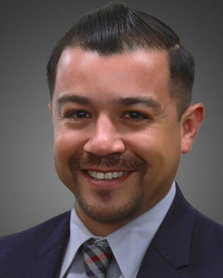 Headshot of Silvestre Madrigal Jr