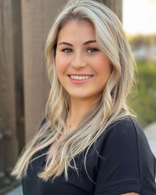 Headshot of Taylor Falabella