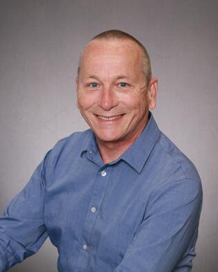 Headshot of James McKeen