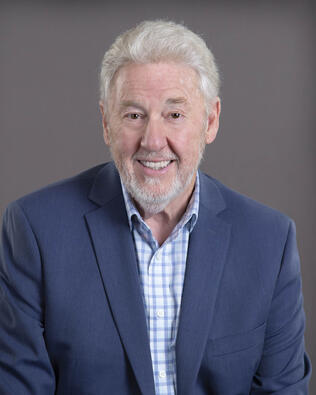 Headshot of Gene Ellis