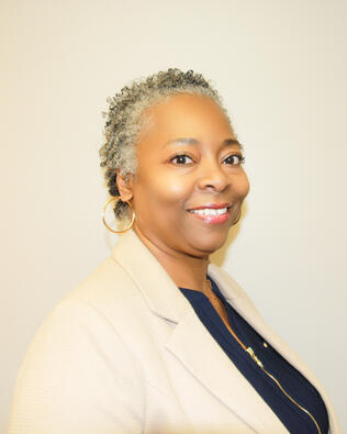 Headshot of Iris Stokes-Burden