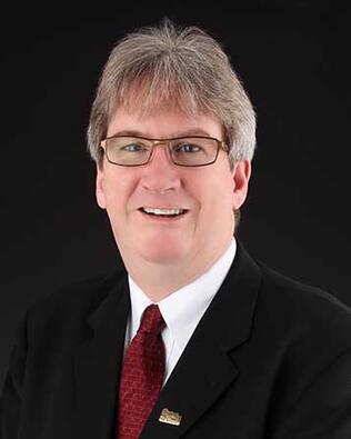 Headshot of Bruce McLean