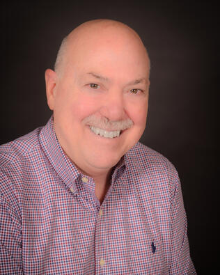 Headshot of John Burns