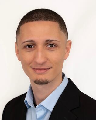 Headshot of William Homar