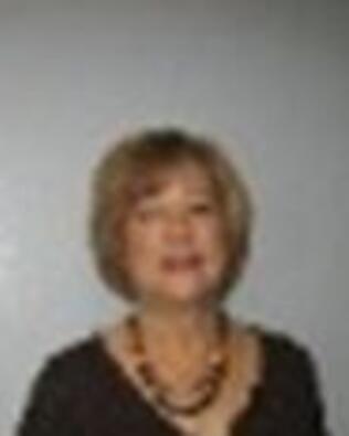 Headshot of ANGELA DELIS