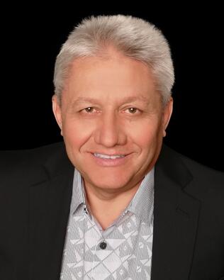 Headshot of Oleg Iossem