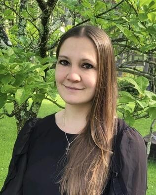 Headshot of Natalie "Nat" Rajsz Steimle