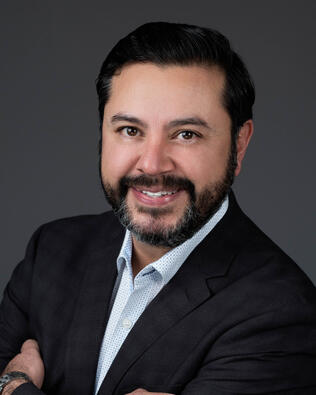 Headshot of Carlos Banuelos