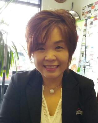 Headshot of In Oak Yang