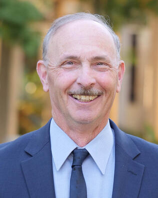 Headshot of John Quartarone