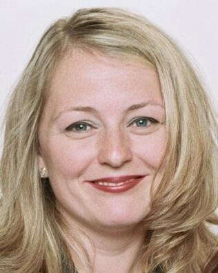 Headshot of Joanna Kuznicka-Beltran