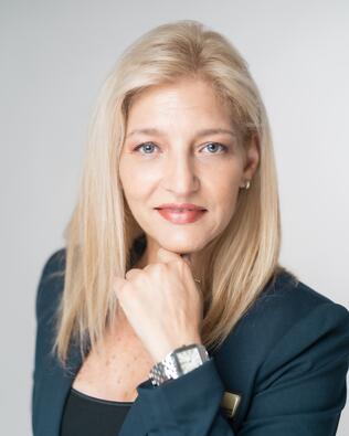 Headshot of Nasiba Azrak