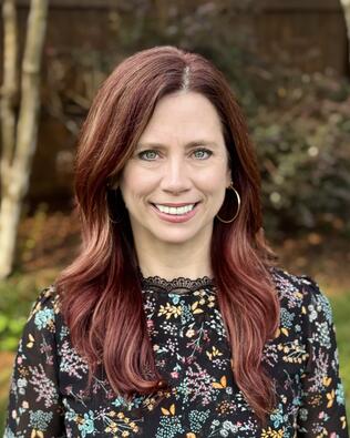 Headshot of Mitzy Bratt
