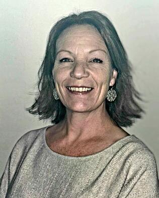 Headshot of Kelly Smith