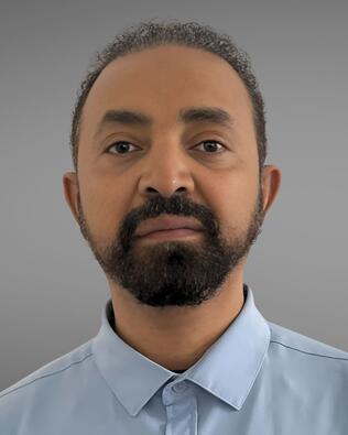 Headshot of Mesfin Birke