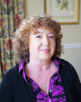 Headshot of Helga L. Schifano