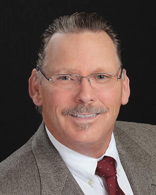 Headshot of Robert Welch