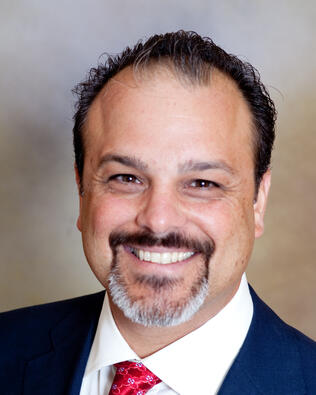 Headshot of Iddo Gavish