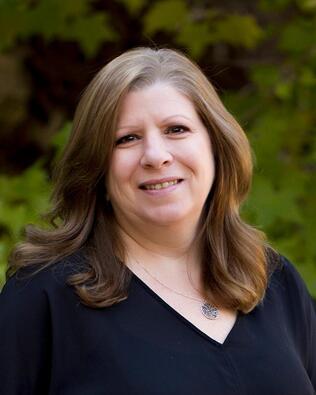 Headshot of Dyan Melanson