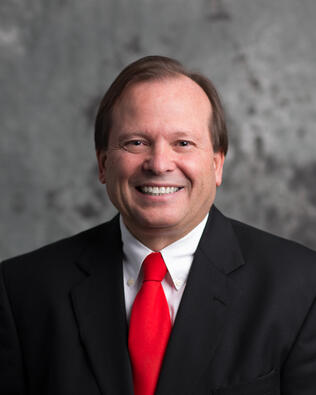 Headshot of Jeffery Eikenberry