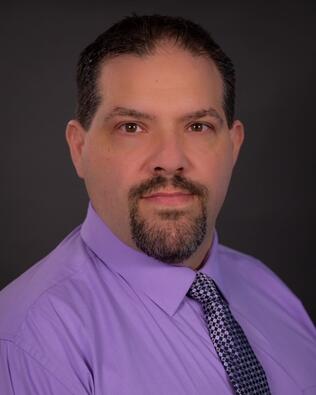 Headshot of James Bambury