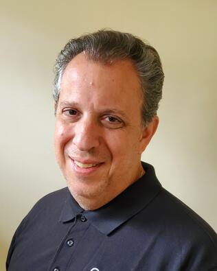 Headshot of Aki Kladis