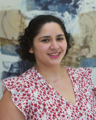 Headshot of Natalis Mena