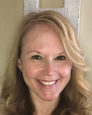 Headshot of Scarlett Higgins