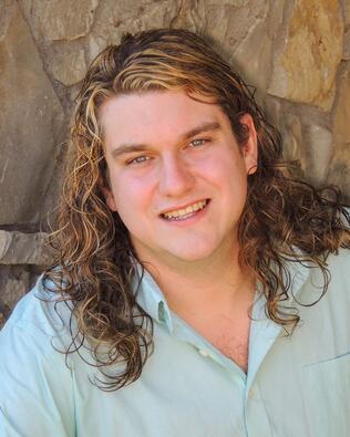 Headshot of Taylor Buckner