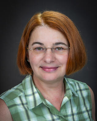 Headshot of Anda C Brandus