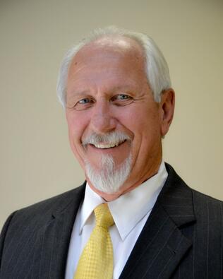 Headshot of Warren Kuntz