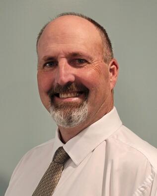 Headshot of Andrew Watkins