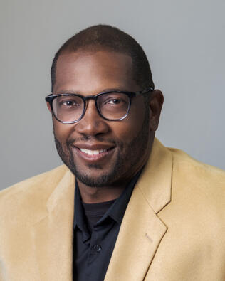Headshot of Clinton Sharp