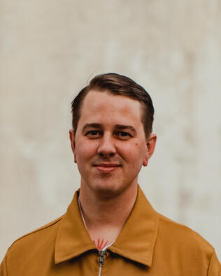Headshot of Jordan Ganas