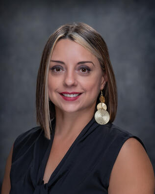 Headshot of Maria Arjona