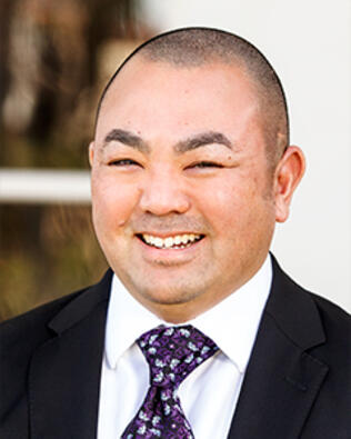 Headshot of Darren Aki