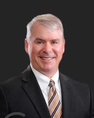 Headshot of Dean Gilbert