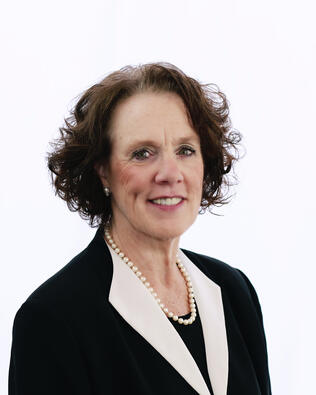 Headshot of Margaret DiCarlo Grub